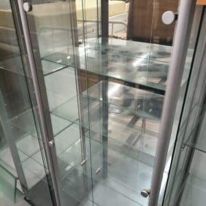 Wide and tall glass display cabinet with shelves