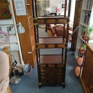 Wooden shelving unit with drawers and cabinet