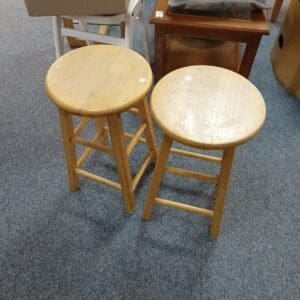 Two wooden round top stools