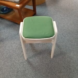 White Stool with Green Seat Pad