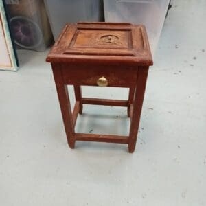Small wooden side table with patterned top