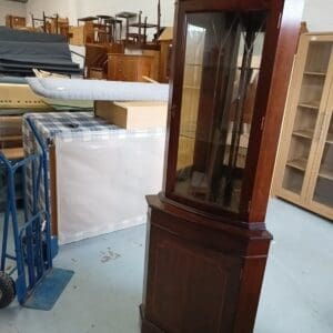 Corner shelf display cabinet