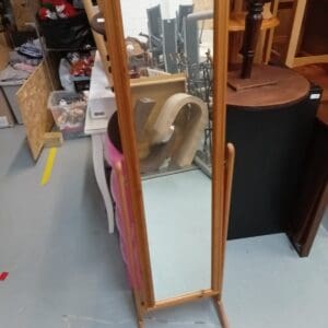 Tall wooden framed mirror
