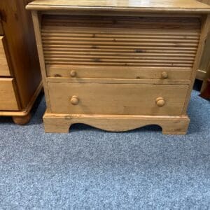 Small wooden sideboard with roll-top door