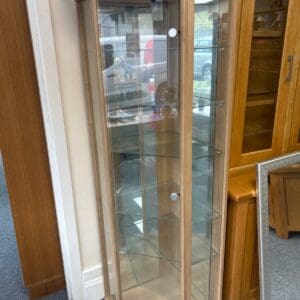 Tall glass fronted display cabinet