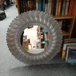 Round silver plastic framed mirror